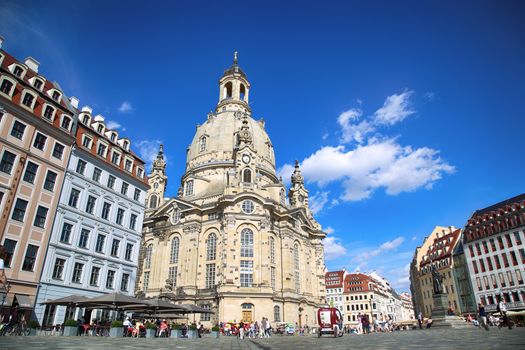 DRESDEN, GERMANY – AUGUST 13, 2016: People walk on Neumarkt Square at Frauenkirche (Our Lady church) in the center of Old town in Dresden, State of Saxony, Germany on August 13, 2016.