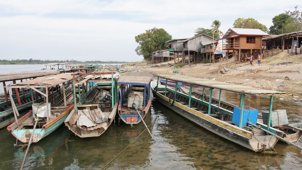 SI PHAN DON, LAOS - FEBRUARY 25, 2016: Typical village allong the Mekong river on February 25, 2016 in Laos, Asia