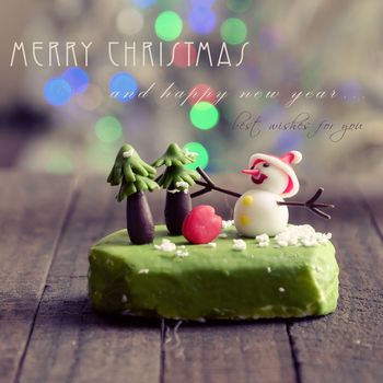 Merry Christmas card with amazing handmade Xmas ornament to congrats winter holiday, abstract handmade artwork as snowman, owl, bird, noel tree diy from clay material for home decoration in wintertime