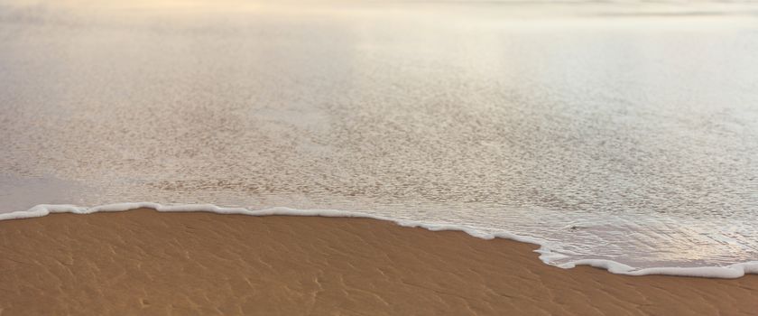 the landscape sea waves close-up on sand