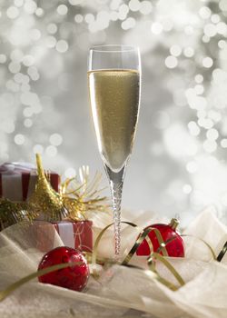 Luxury champagne glass, gift and decoration on an abstract grey background