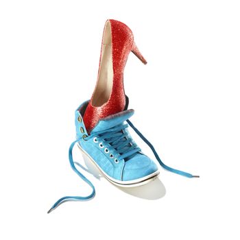 Classic stiletto high heels shoe in a red snake-print design put in a blue sport shoe
