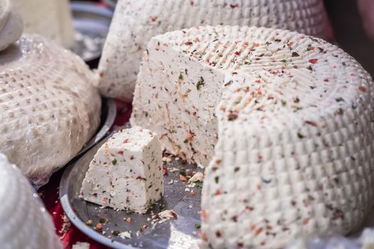 pieces of delicious white cheese with spices