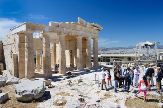 Athens, Greece - April 17th, 2016: People at Parthenon temple entrance on the Acropolis in Athens, Greece