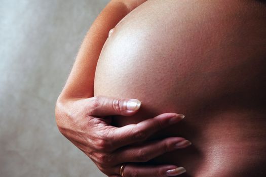 The pregnant woman on the ninth month. The girl was born