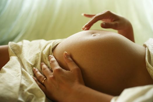 The pregnant woman on the ninth month. The girl was born