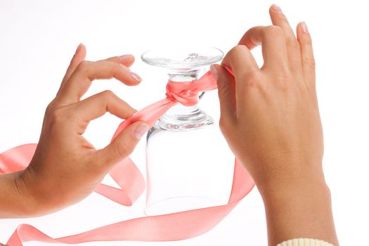 Woman's hand and band on a glasses