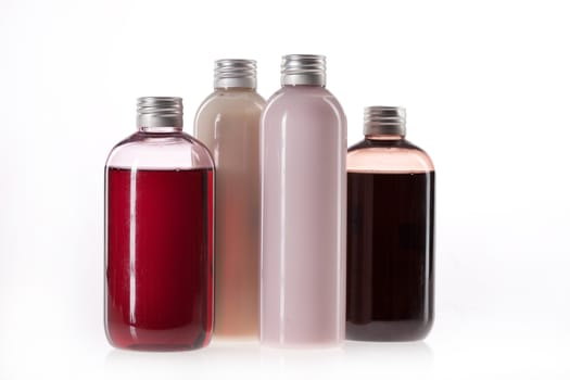 Bottles with multicolored on an isolated background