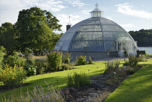 Old Greenhouse Dome in Bergiansk Botanical Garden. Is is a public botanical garden located in Frescati next to Brunnsviken, at Norra Djurgården in Stockholm -Sweden.