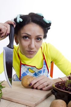 Housewife is preparing in the kitchen on a white background