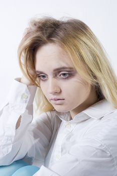 Young woman with depression isolated on white background