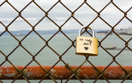 German love declaration on a padlock in San Francisco Golden Gate - Shallow depth of field