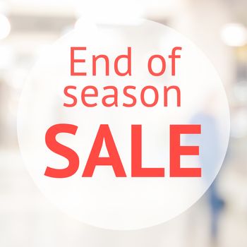 End of season sale sign over blurred store background. Design for shop and sale banners