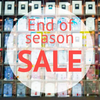 End of season sale sign over blurred store background. Design for shop and sale banners