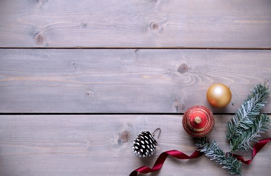 Christmas decorations on a wooden background with space 