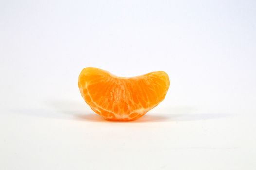 Tangerine parts on a white background