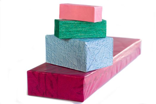 Colourful and bright shopping boxes for gifts and presents, red, pink, blue and green