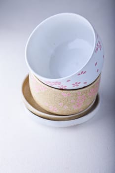 Empty ceramic bowls on a white background
