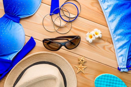 beach theme objects on the wooden floor view from above