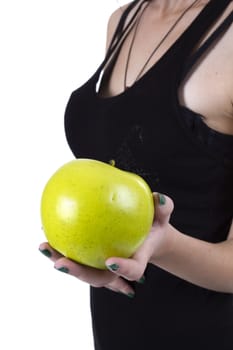 Green apple in hand on white background