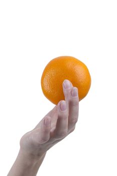 Orange ripe mandarin in the hands of a young woman