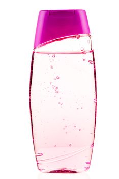 shower gel in a pink bottle close-up on a white background isolated