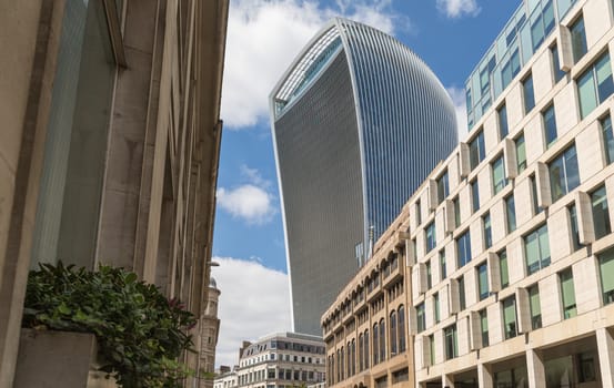 Business and Financial District of London - a tall curved building stands high above the rest