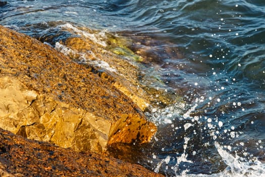 Stones of the sea breakwater. Horizontal image.