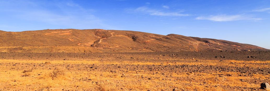 Beautiful Moroccan Mountain landscape in desert with blue sky