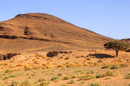 Beautiful Moroccan Mountain landscape in desert with blue sky