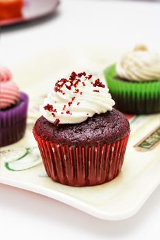 Red velvet cupcake on a professional bakery. Vertical image.