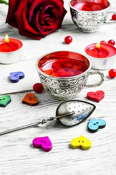 couple cups of tea and symbolic heart for Valentine's day