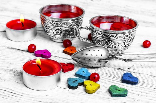 couple cups of tea and symbolic heart for Valentine's day
