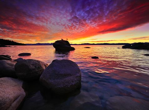 The northern part of Lake Tahoe straddles the border between Calfiornia and Nevada. It's dominant features are big glaciated boulders and clear blue waters.