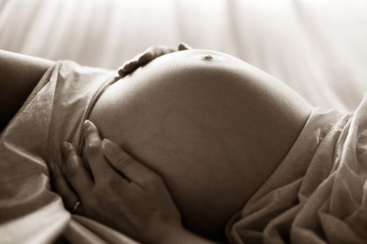 The pregnant woman on the ninth month. The girl was born