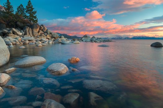 The northern part of Lake Tahoe straddles the border between Calfiornia and Nevada. It's dominant features are big glaciated boulders and clear blue waters.