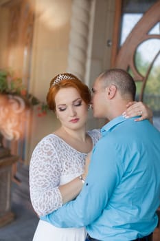 wedding copule. Beautiful bride and groom. Just merried. Close up. Happy bride and groom on their wedding hugging.