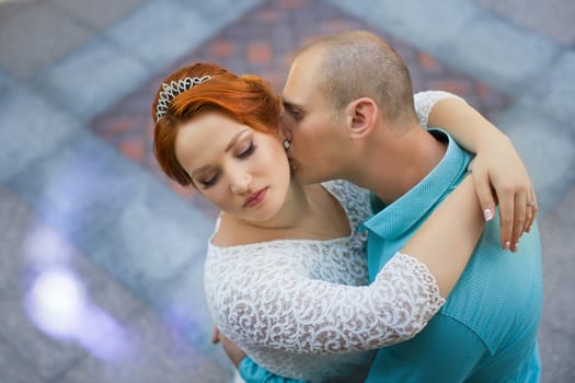 wedding copule. Beautiful bride and groom. Just merried. Close up. Happy bride and groom on their wedding hugging.