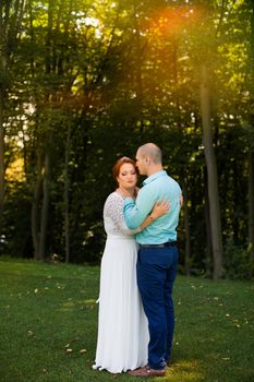 wedding copule. Beautiful bride and groom. Just merried. Close up. Happy bride and groom on their wedding hugging.