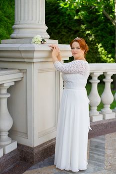 Bride big body on the wedding day for a walk