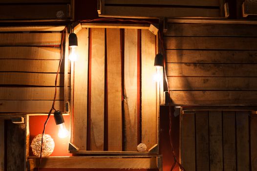 decor of wooden boxes and lights in the Studio.