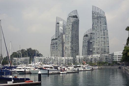 Singapore - 01 November 2014: Famous popular Reflections at Keppel Bay by Daniel Libeskind