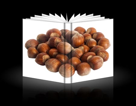 a book of hazelnuts over a black background