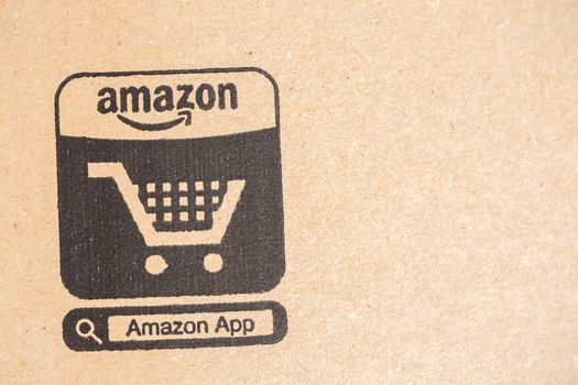 Paris, France - December 15, 2016: Amazon Prime Parcel Package. close-up on Ecommerce icon. Amazon, is an American electronic commerce and cloud computing company,based in Seattle, Washington. Started as an online bookstore, Amazon is become the most importrant retailer in the United States by market capitalization