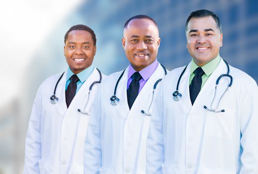 Handsome African American and Hispanic Male Doctors Outside of Hospital Building.