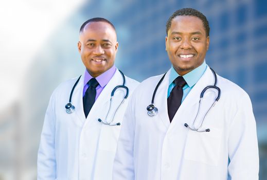 Handsome African American Male Doctors Outside of Hospital Building.