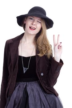 Portrait of a young woman in a hat on a white background