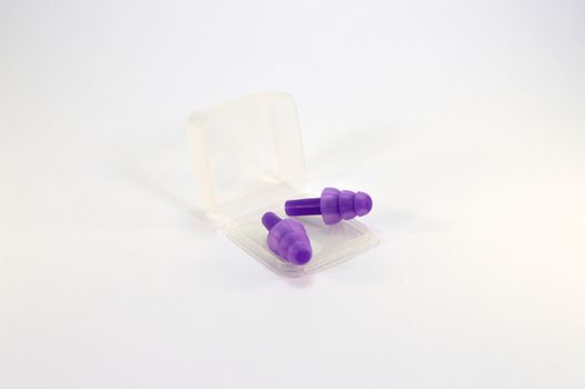 Pair of purple silicone earplugs for ears