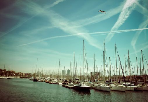 Spain. Barcelona. Yacht club at sunset. A lot of masts