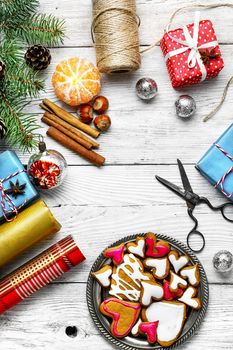 Christmas time, home cookies and xmas spices with gift boxes